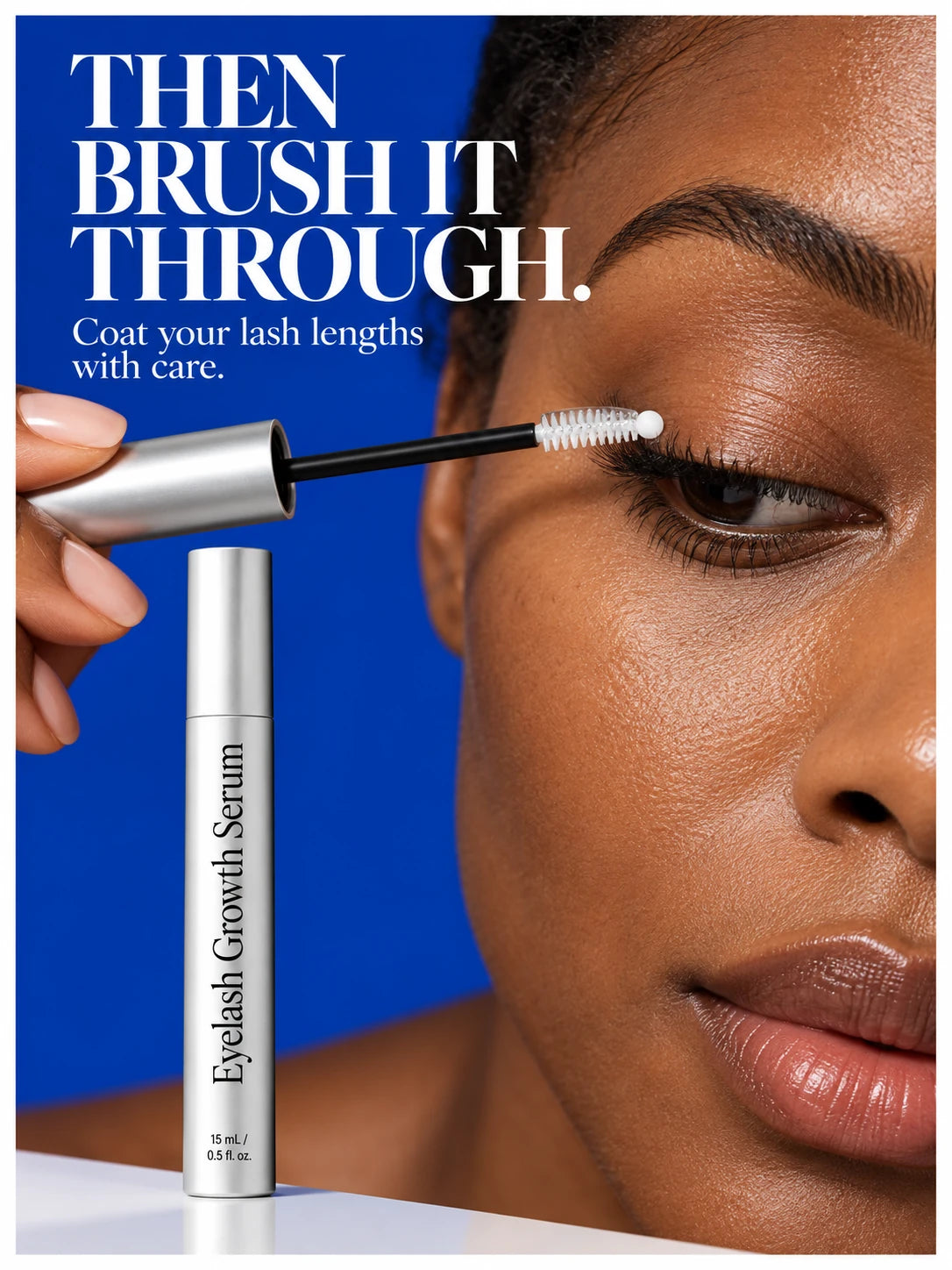 Curved serum brush combing through the lashes.