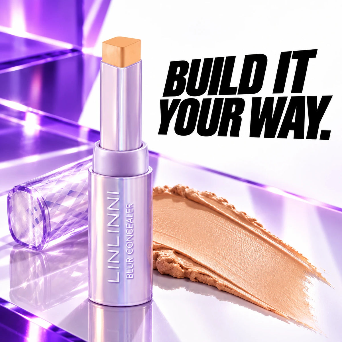 Creamy concealer texture beside the LINLINNI stick.
