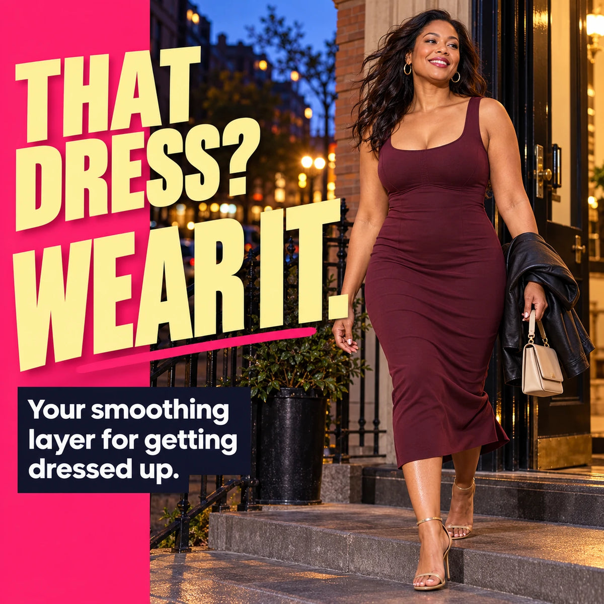 An adult woman wearing a burgundy midi dress for an evening out.